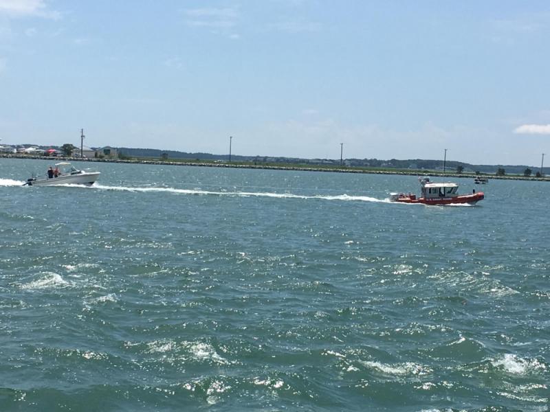The U.S. Coast Guard at Indian River Inlet tows a boat that was taking on water in July 2016. U.S. COAST GUARD PHOTO